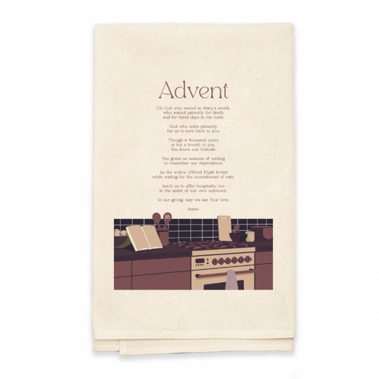 Beige towel with a kitchen illustration and 'Advent' text on a white background