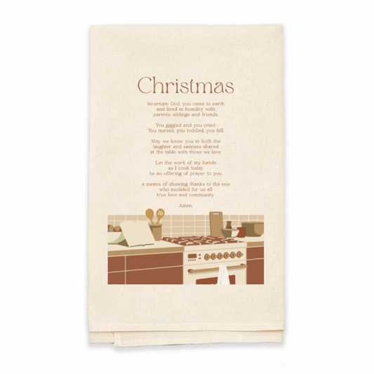 Beige towel with Christmas text and vintage kitchen illustration on a white background