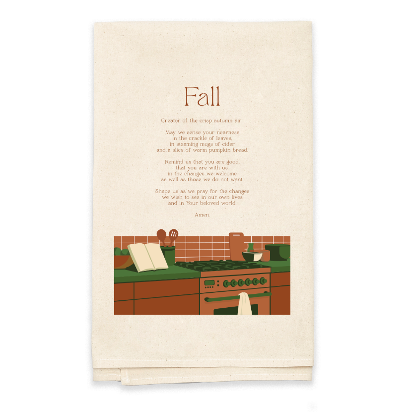 Beige towel with a kitchen illustration and 'Fall' text on a white background