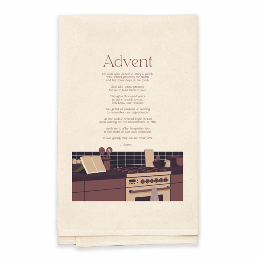 Beige towel with a kitchen illustration and 'Advent' text on a white background