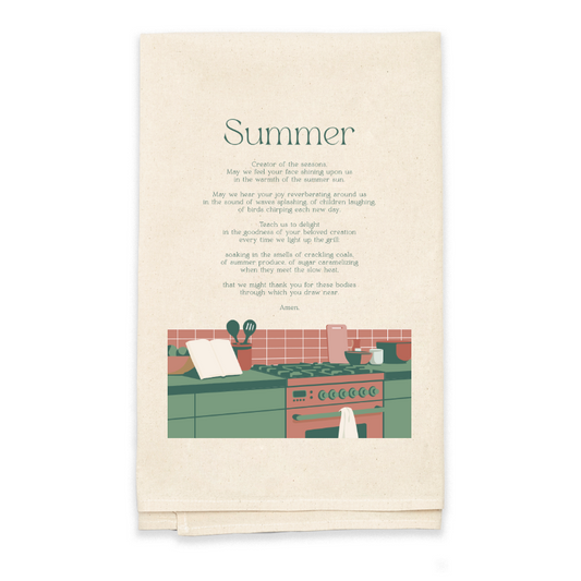 Kitchen-themed tea towel with a design of a kitchen and text on a white background