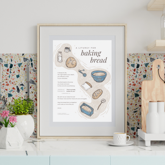 Framed poster with bread-making diagram on a kitchen counter